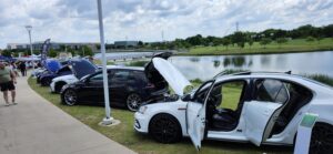 Water-cooled Volkswagen cars by the pond at Dub Splash